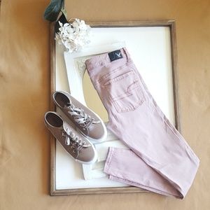 Distressed dusty pink jeans
